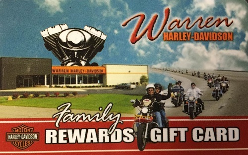 A retro-looking print-photo of the dealership storefront with riders waving as they ride by.